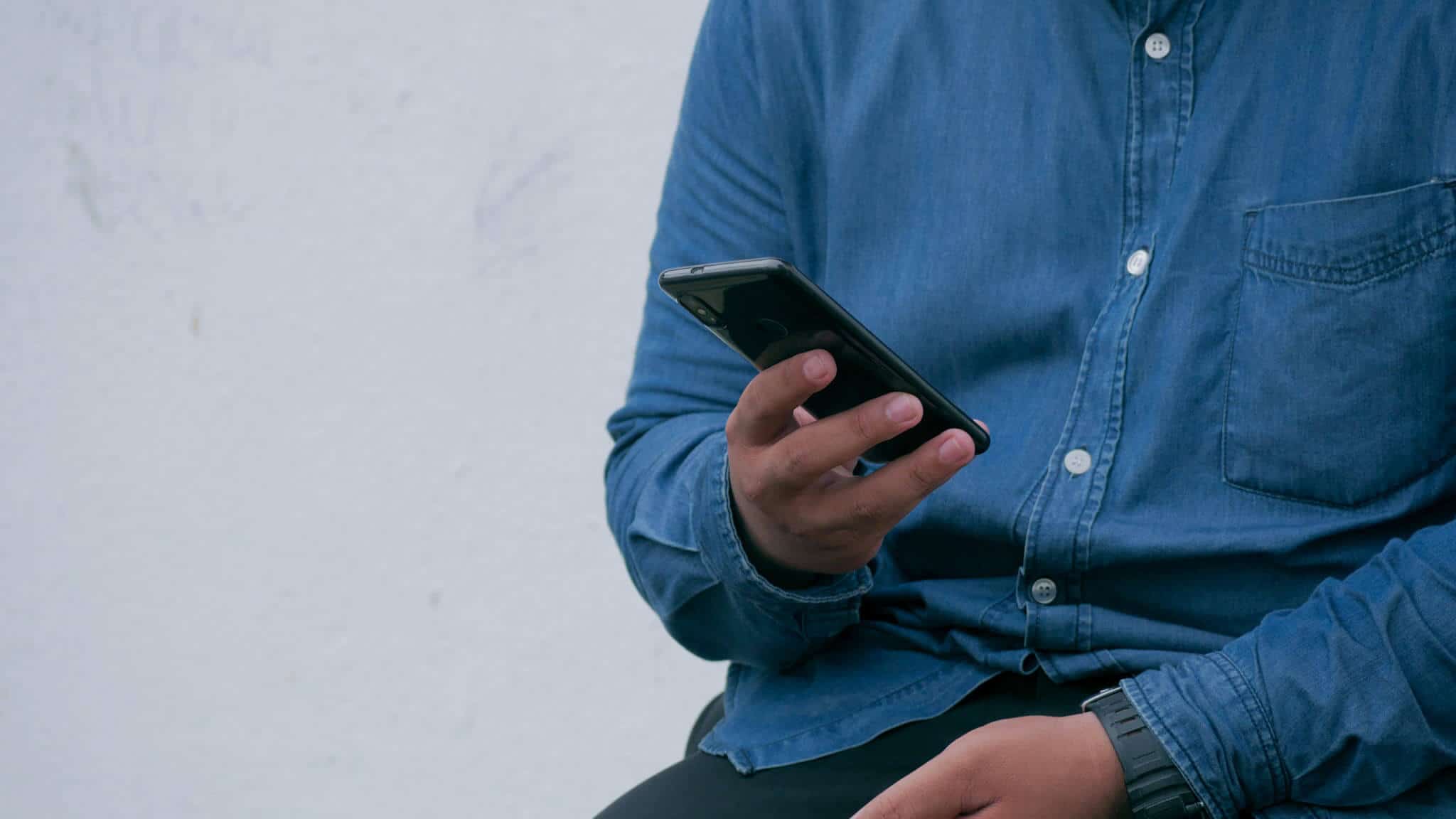 Close up of phone in man's hand