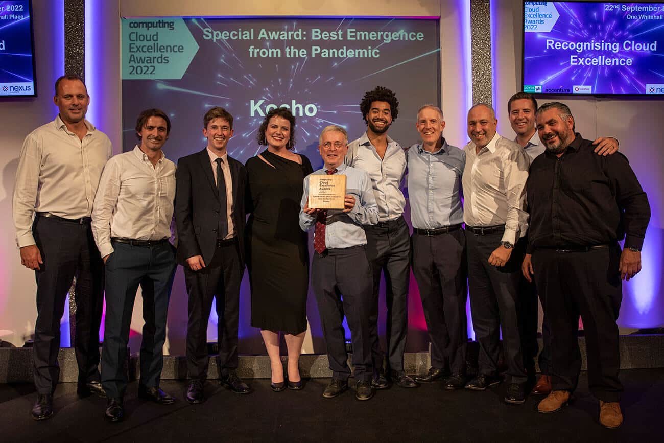 Team Kocho stands on stage to collect the award for Best Emergence from the Pandemic.